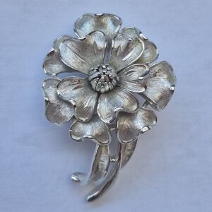 Vintage Corocraft silver tone textured flower brooch